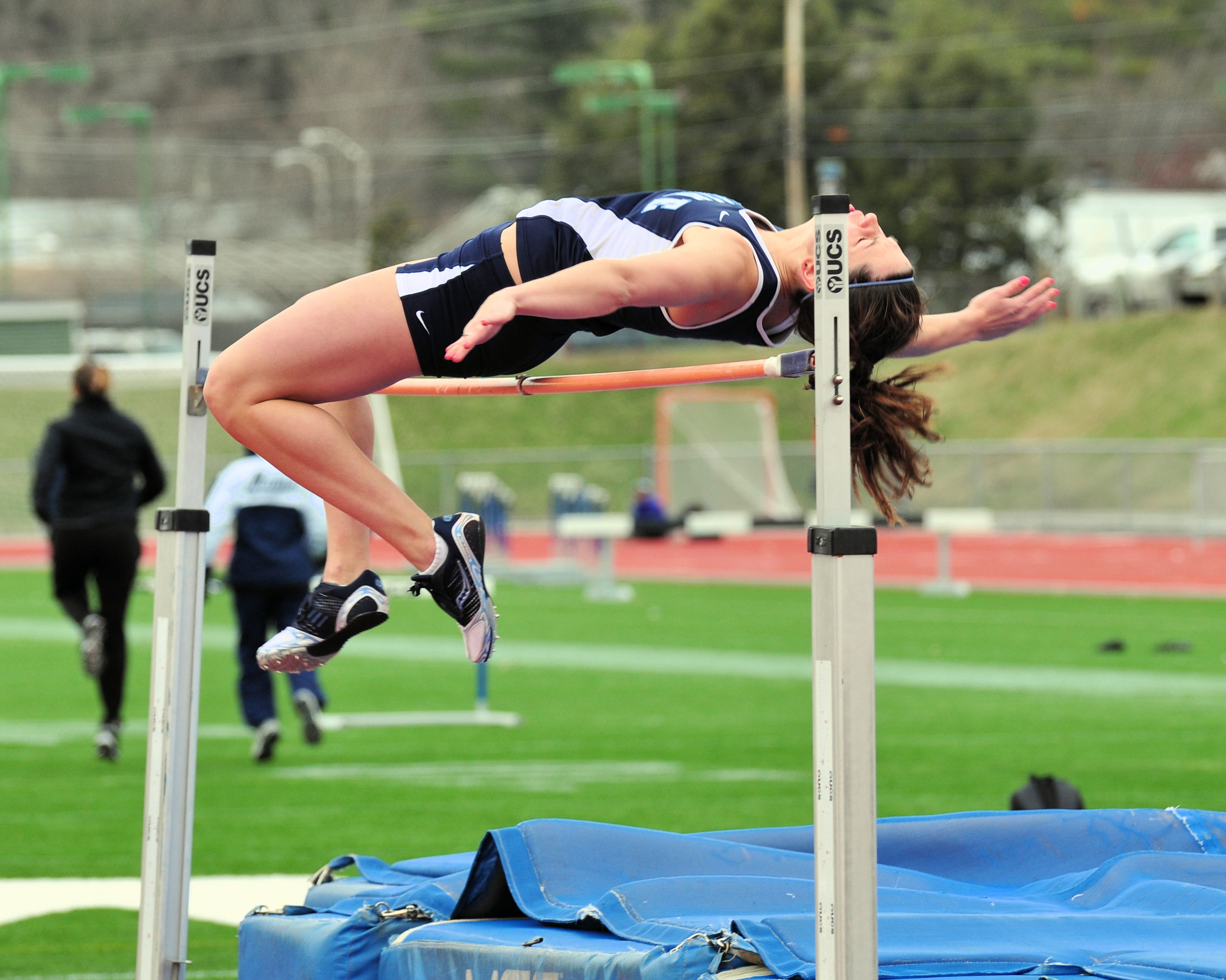 An image of a high jumper symbolizing high expectations